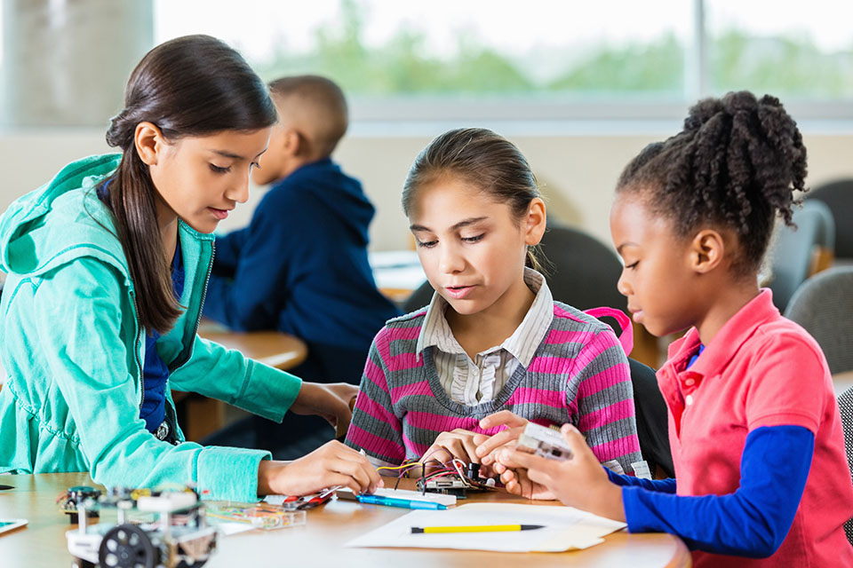 students building a robotics project